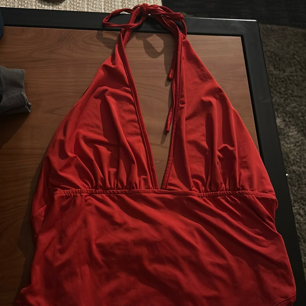 red backless body suit